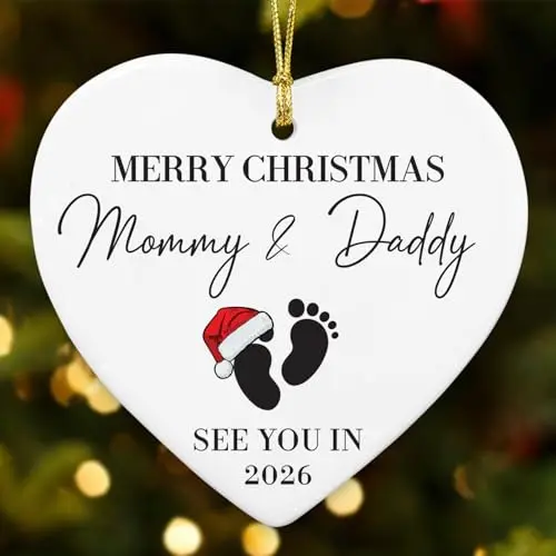 White ceramic Christmas ornament with a double-sided pregnancy announcement design