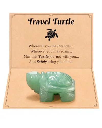 Small green aventurine stone turtle figurine on a wooden surface
