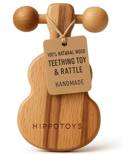 Natural, unpainted wooden baby teething toy and rattle made from smooth beechwood.