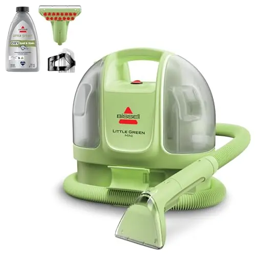 BISSELL Little Green Mini portable cleaner in Tea Green, showing its compact size.