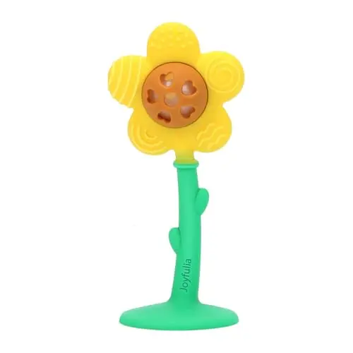 Yellow sunflower-shaped silicone baby teether with a rattle inside and a suction cup base.