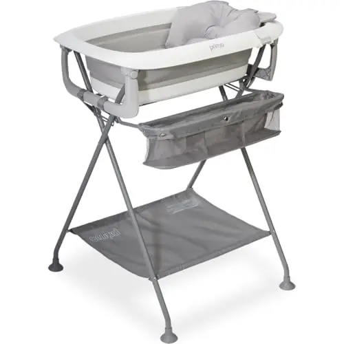 Primo SquishSplash collapsible baby bath tub set up on a folding stand with storage shelves, in grey.