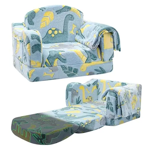 Green Airpanda dinosaur-themed toddler chair that glows, shown with a blanket.