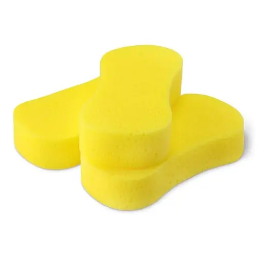 Three large yellow Amazon Basics car wash sponges next to a bucket