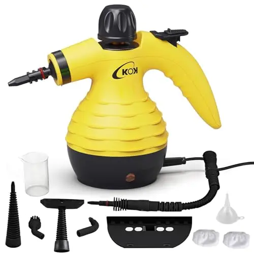 KOK compact handheld steam cleaner and attachments kit on a table