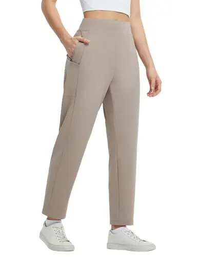 BALEAF women's khaki travel pants with multiple pockets, shown in a casual standing pose.