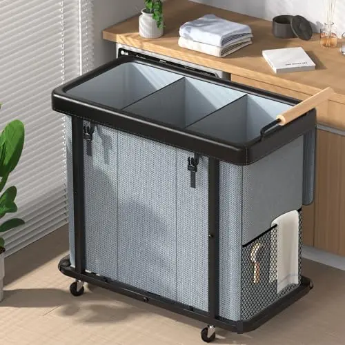 Elowen 3-Section Laundry Hamper with gray fabric, leather accents, and wheels