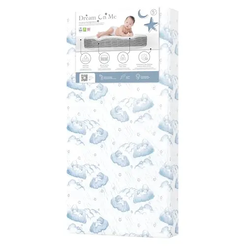 Dream On Me Nap Nest crib mattress with blue cloud design