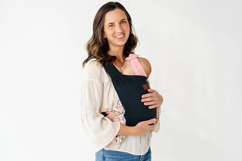 Happy! Haven Baby Carrier with cross-back straps in a soft fabric, shown in a front carry position