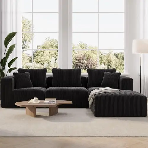 Novilla black modular L-shaped sectional sofa with wide track arms in a minimalist apartment